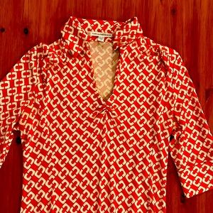 Stunning vintage Diane von Furstenberg polo dress in orange print 100% silk